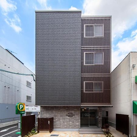 Grand Base Okayama Ekimae Aparthotel Exteriör bild