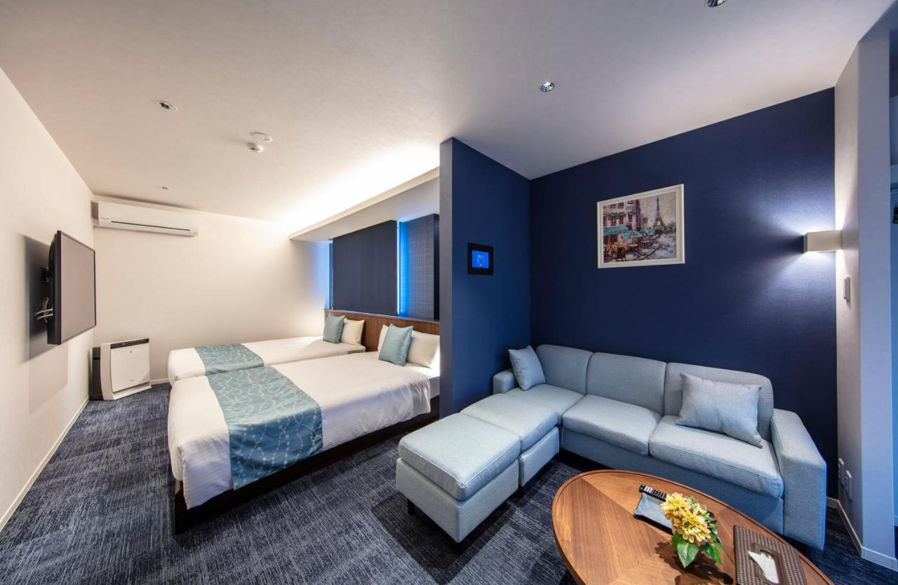 Grand Base Okayama Ekimae Aparthotel Exteriör bild