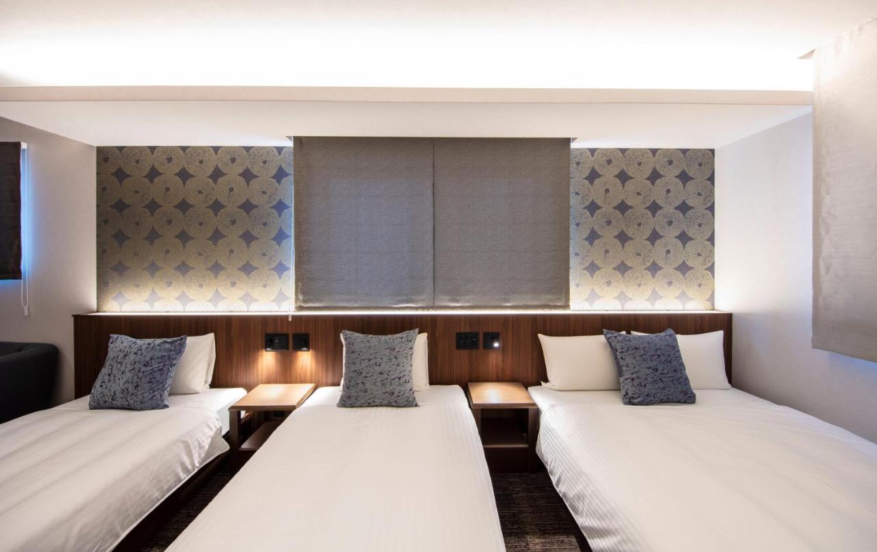 Grand Base Okayama Ekimae Aparthotel Exteriör bild