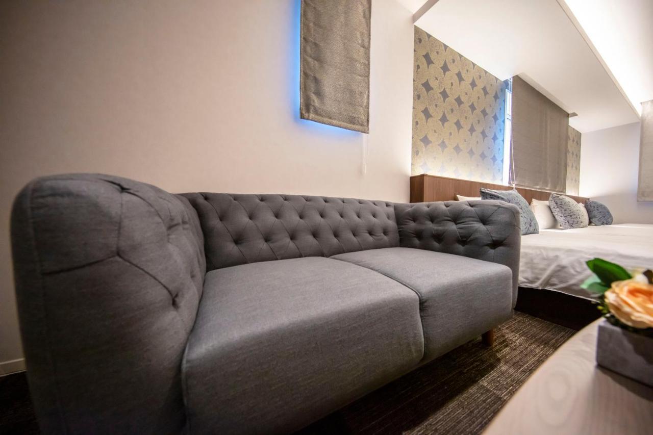 Grand Base Okayama Ekimae Aparthotel Exteriör bild