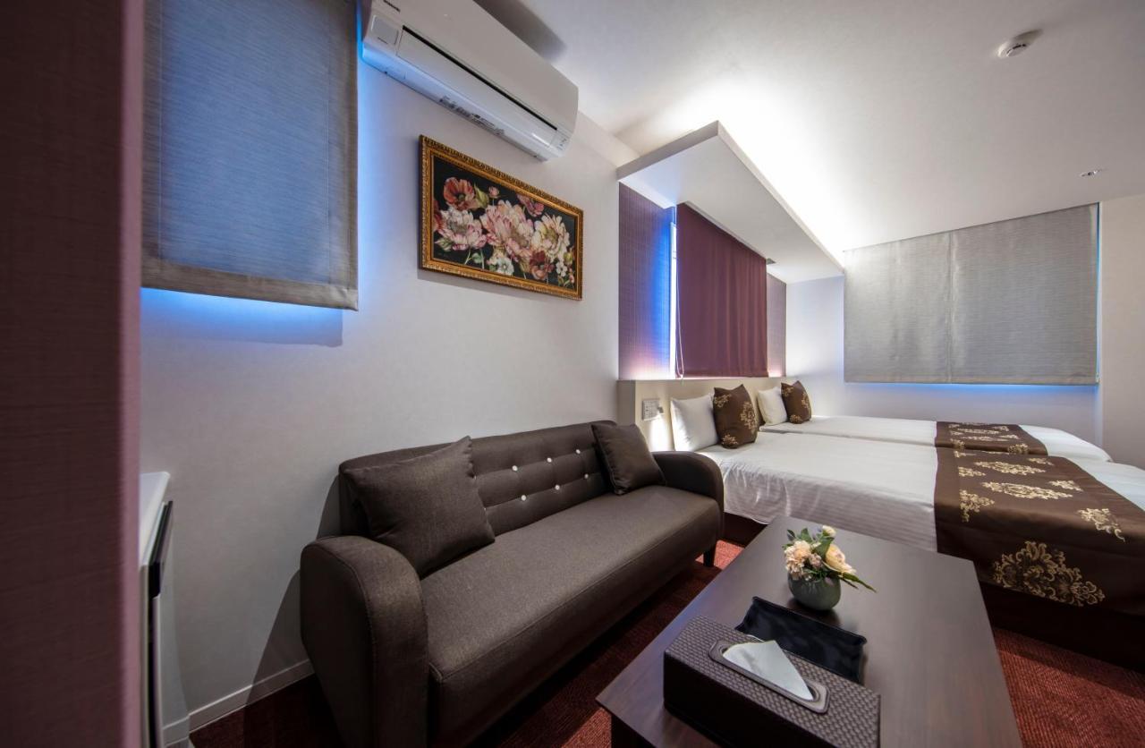 Grand Base Okayama Ekimae Aparthotel Exteriör bild