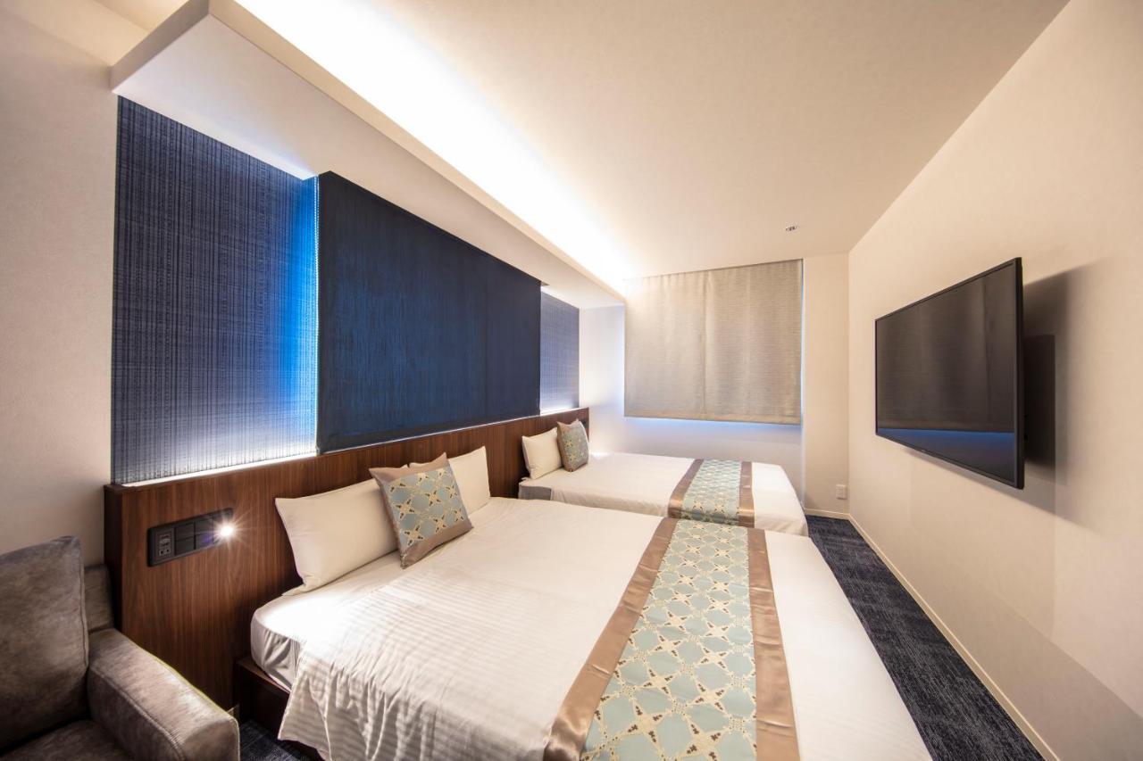 Grand Base Okayama Ekimae Aparthotel Exteriör bild