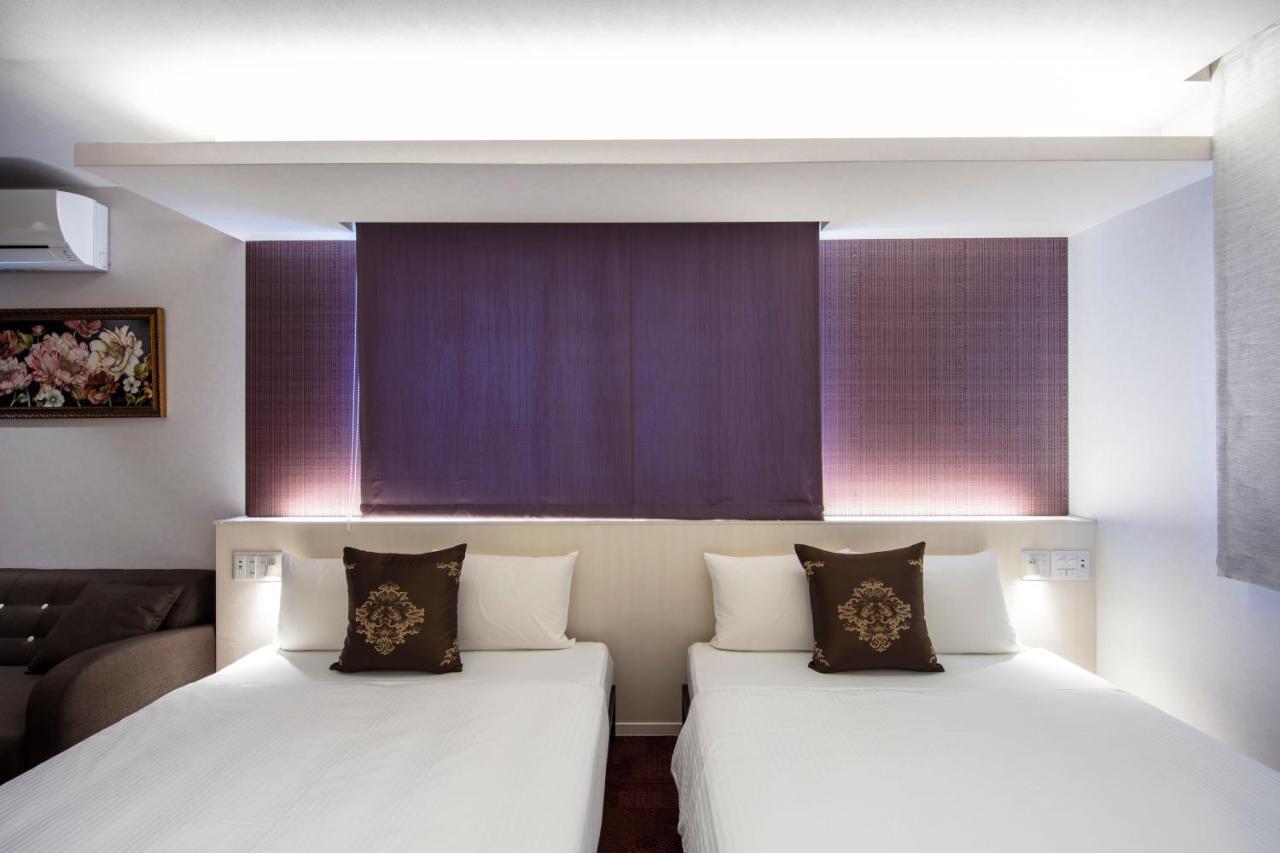 Grand Base Okayama Ekimae Aparthotel Exteriör bild