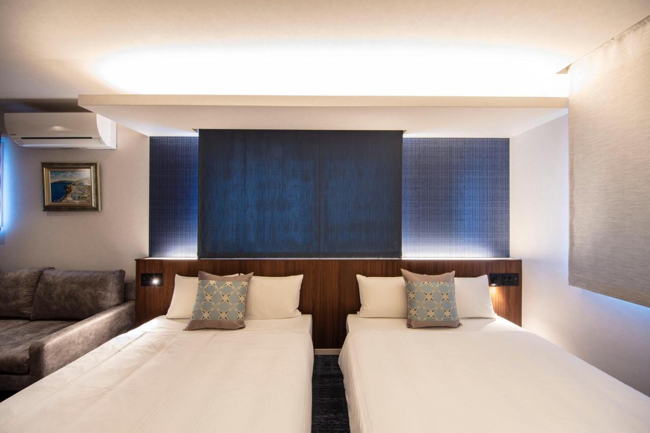 Grand Base Okayama Ekimae Aparthotel Exteriör bild