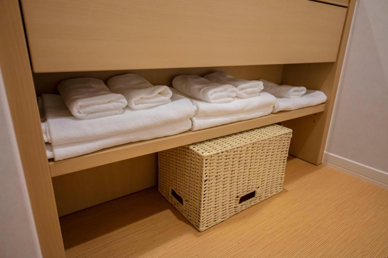 Grand Base Okayama Ekimae Aparthotel Exteriör bild