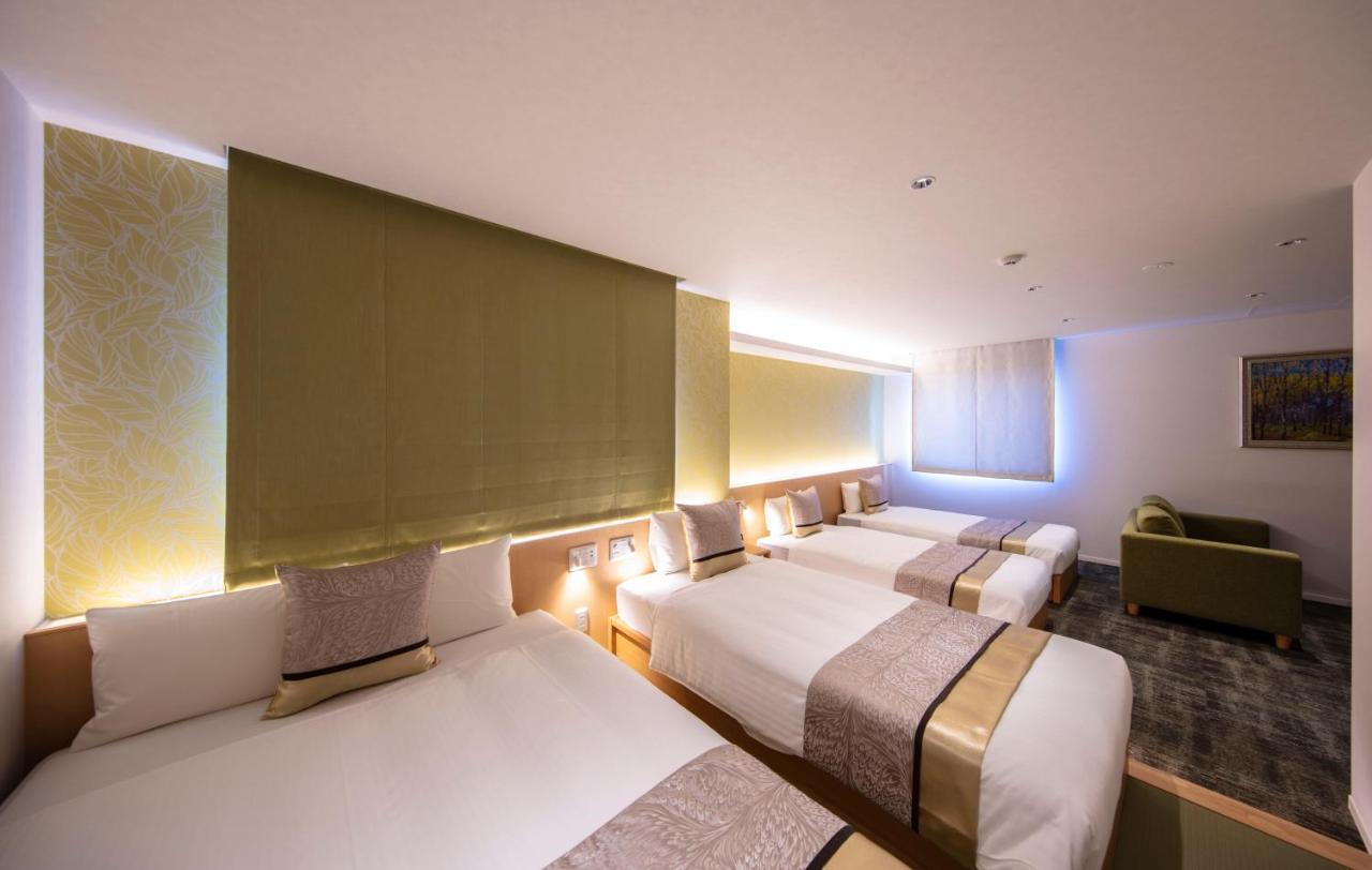 Grand Base Okayama Ekimae Aparthotel Exteriör bild
