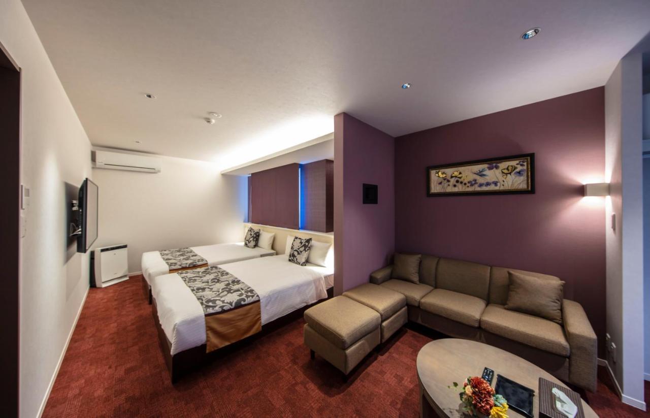Grand Base Okayama Ekimae Aparthotel Exteriör bild